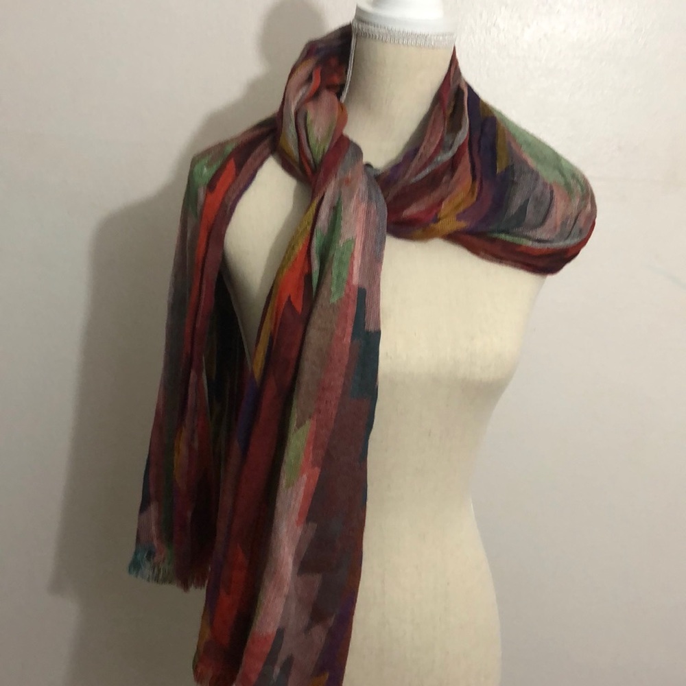 Scarf of many colors 74” x 20”. Dark earth tones.